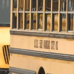 Kansas City, Kansas school bus after a shooting incident that left one man dead and students unharmed